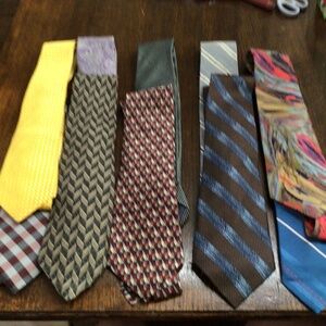 10 men’s ties. 4 are 100% silk. Misc, brands. All in great shape.